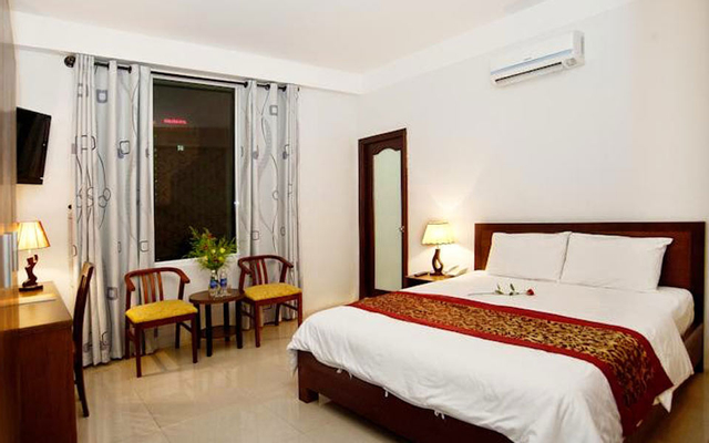 Phòng ngủ ở khách sạn Bông Hồng